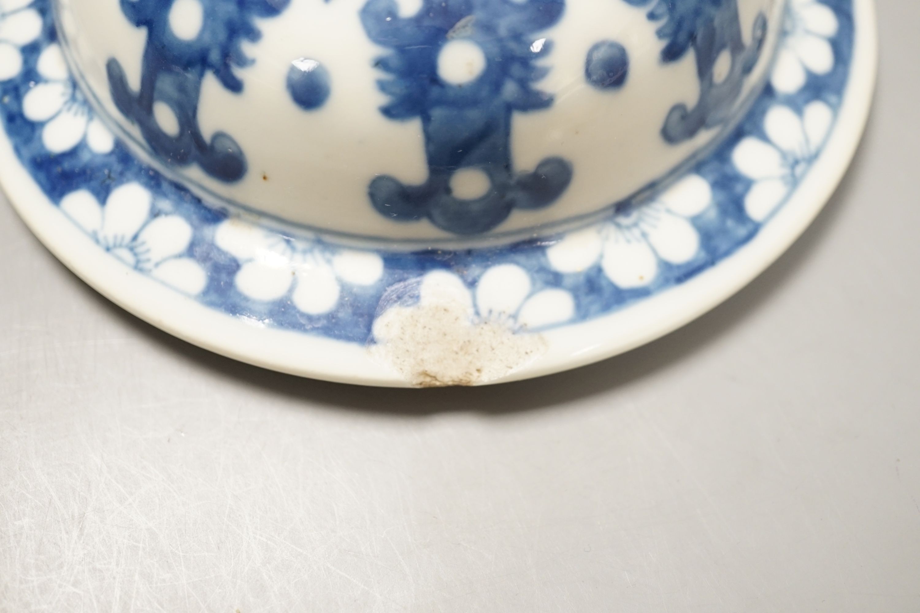 An 18th century Chinese export teabowl, a Chinese blue and white vase cover, similar teabowl and past box and cover.